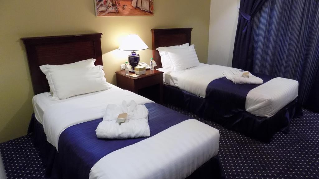 Onizah Hotel Unaizah Rum bild